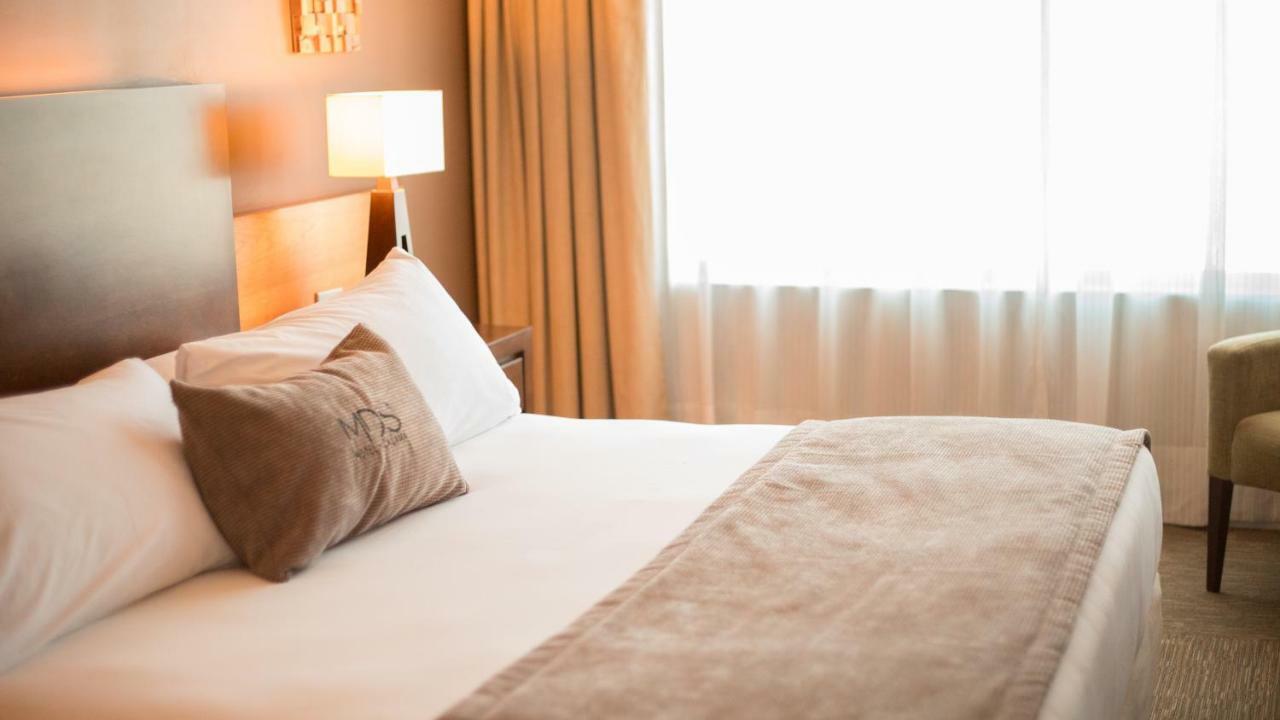 Mds Hotel Calama Eksteriør billede A bed runner